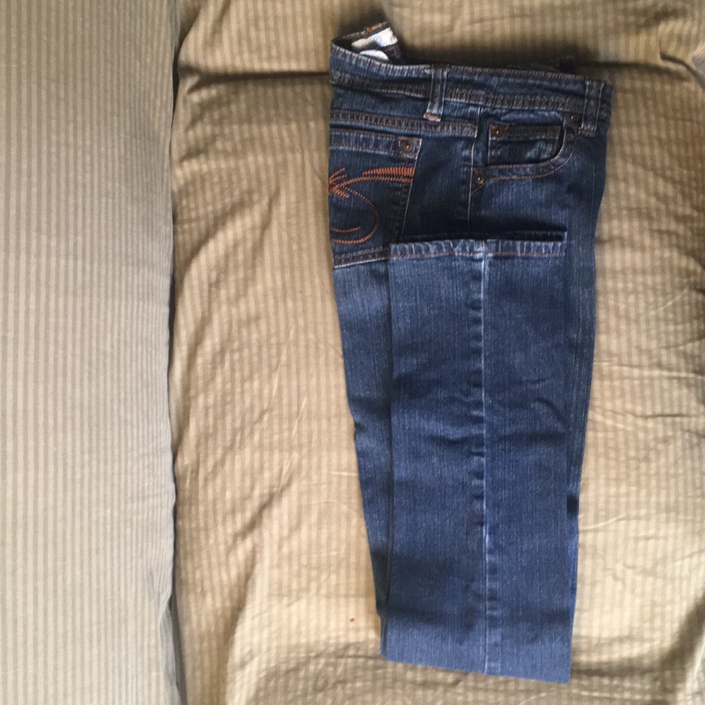 Dark wash skinny jeans with copper threading